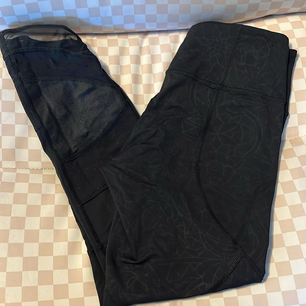 Lululemon black leggings size 4